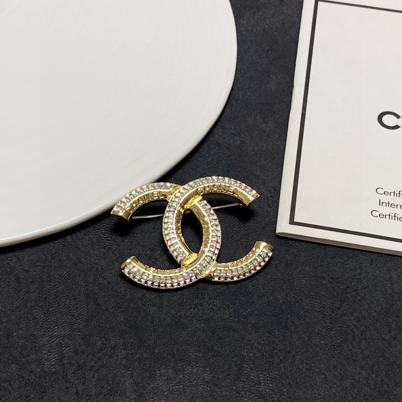 Ch**el brooches